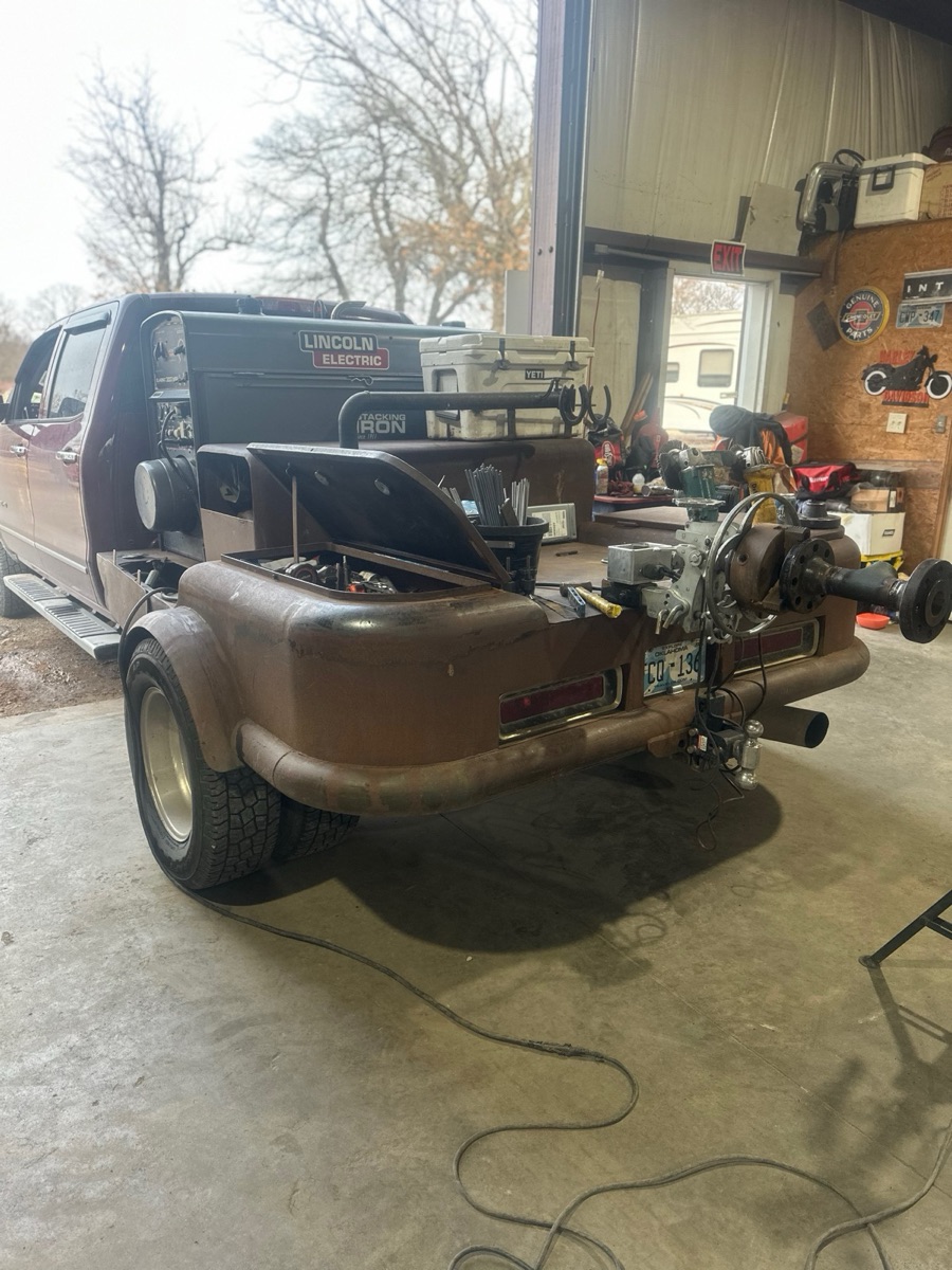 Rear view of a welding truck with Lincoln Electric welder and equipment at the shop